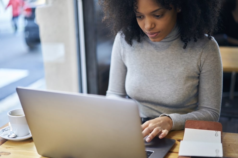 woman reviewing her credit report