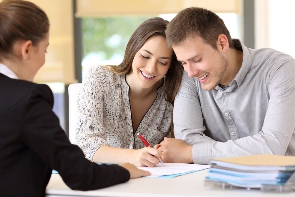 couple signing a contract