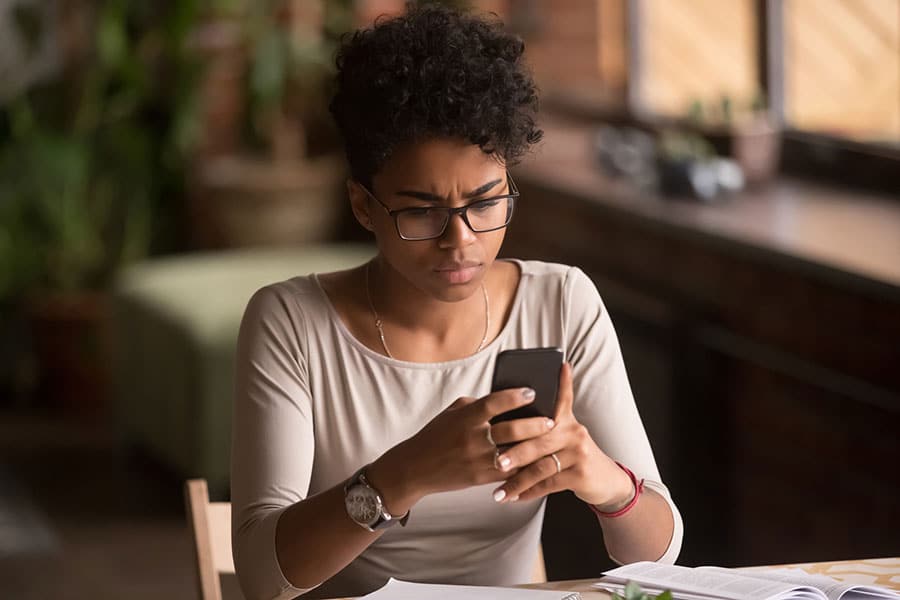 woman holding smartphone