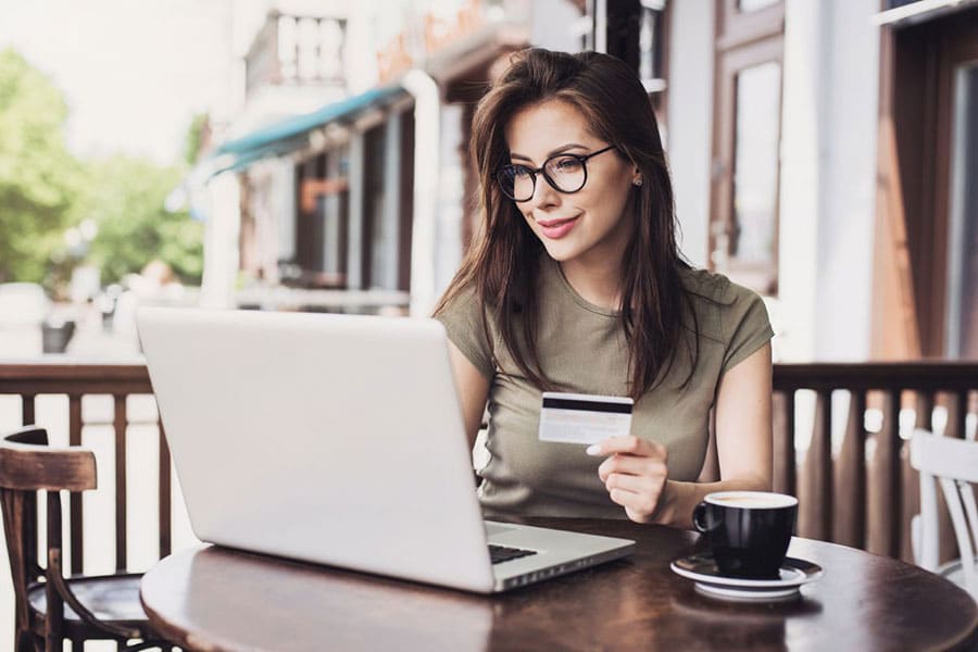 woman holding credit card