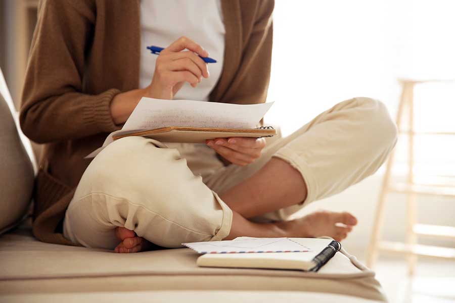 woman writing goodwill letter