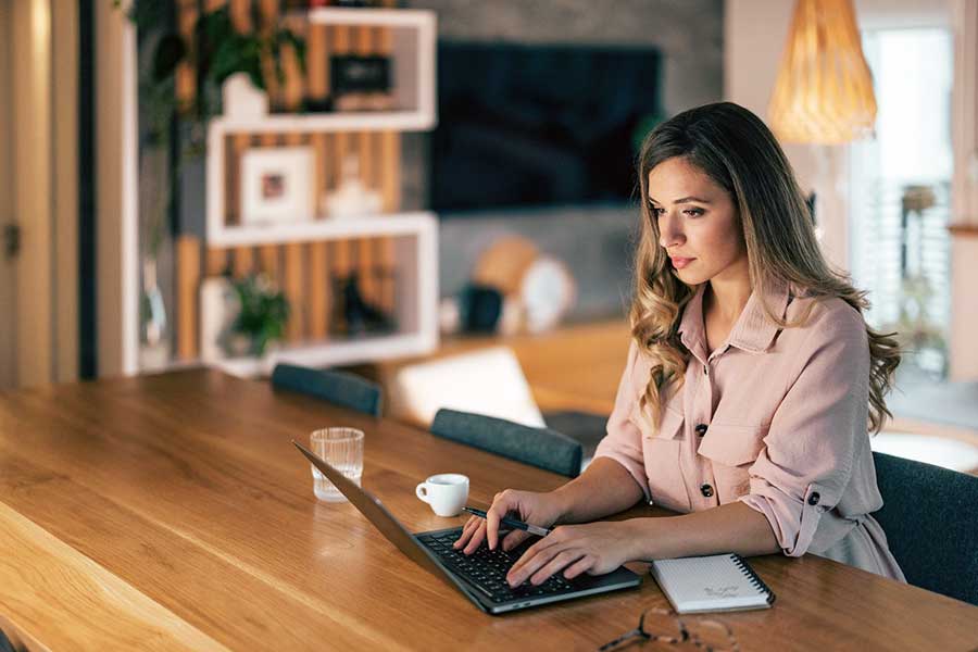 woman checking credit online