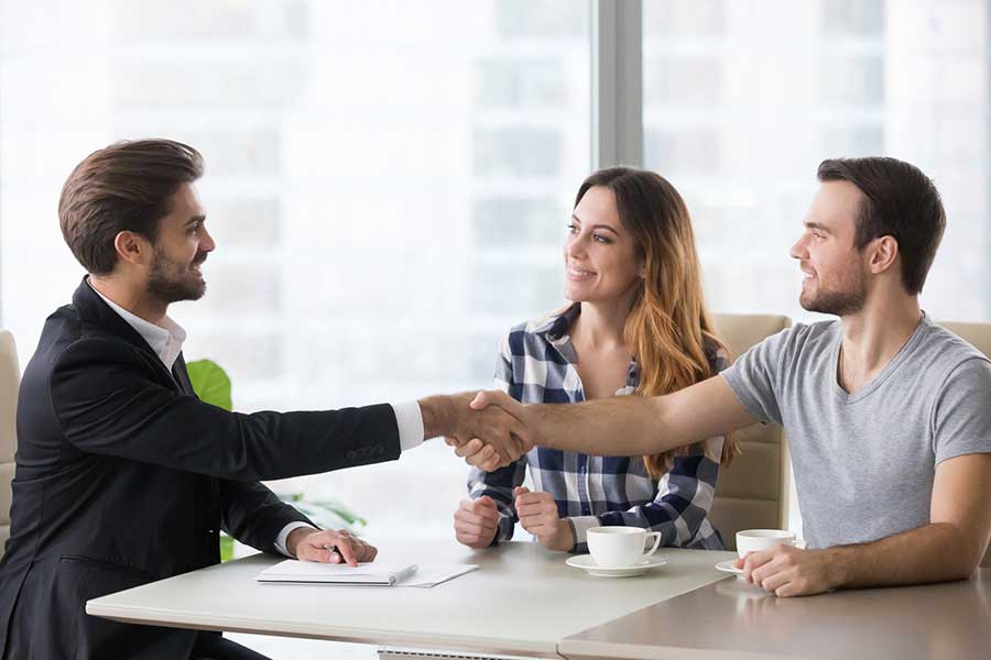couple meeting with lawyer